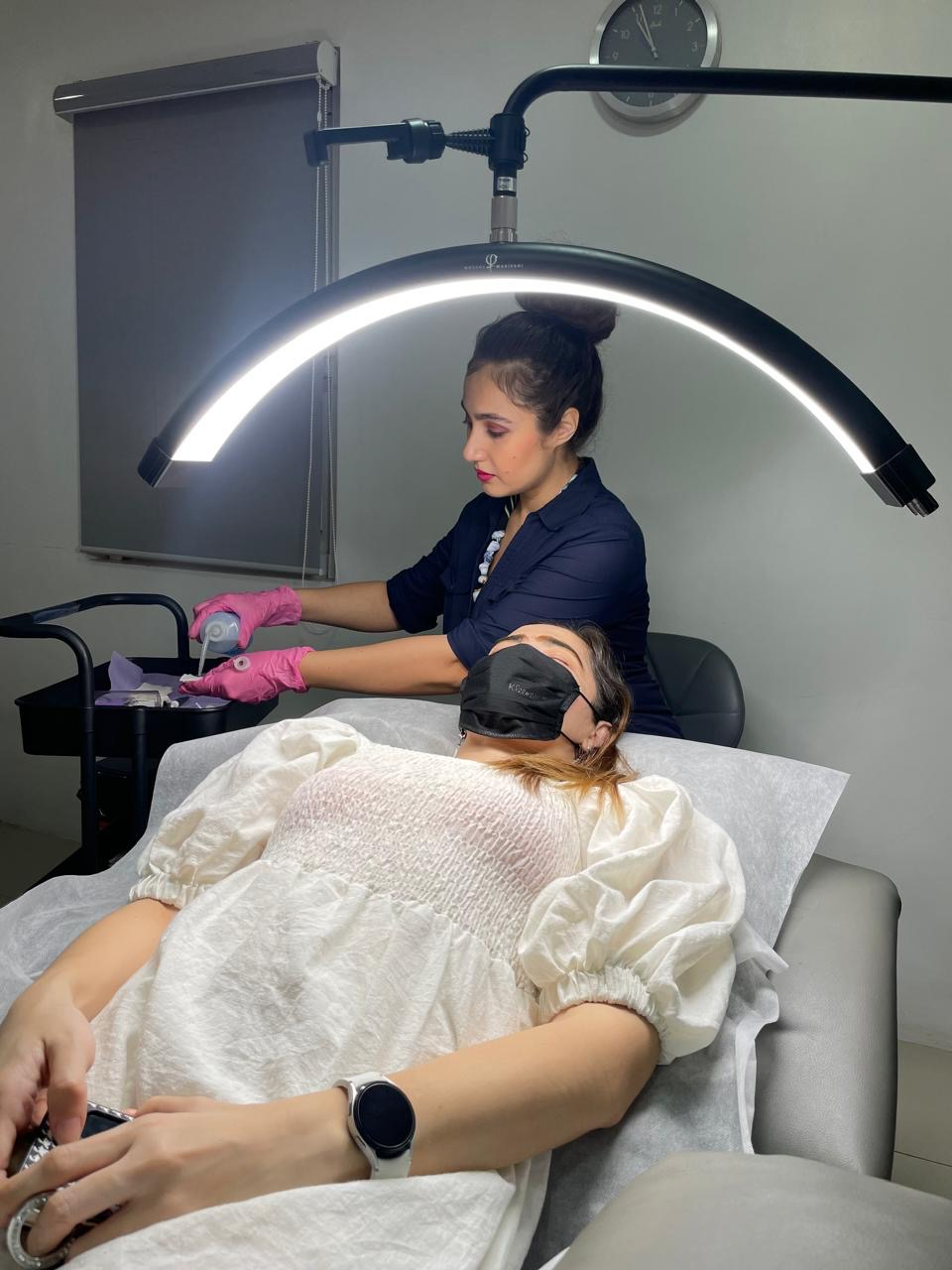 Brow design in the HEADS studio — every session starts with careful mapping